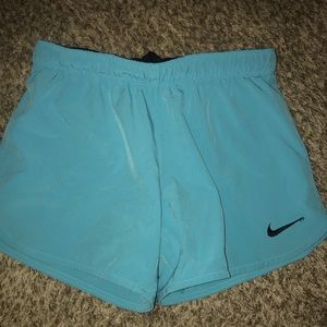 Nike turquoise reflective shorts